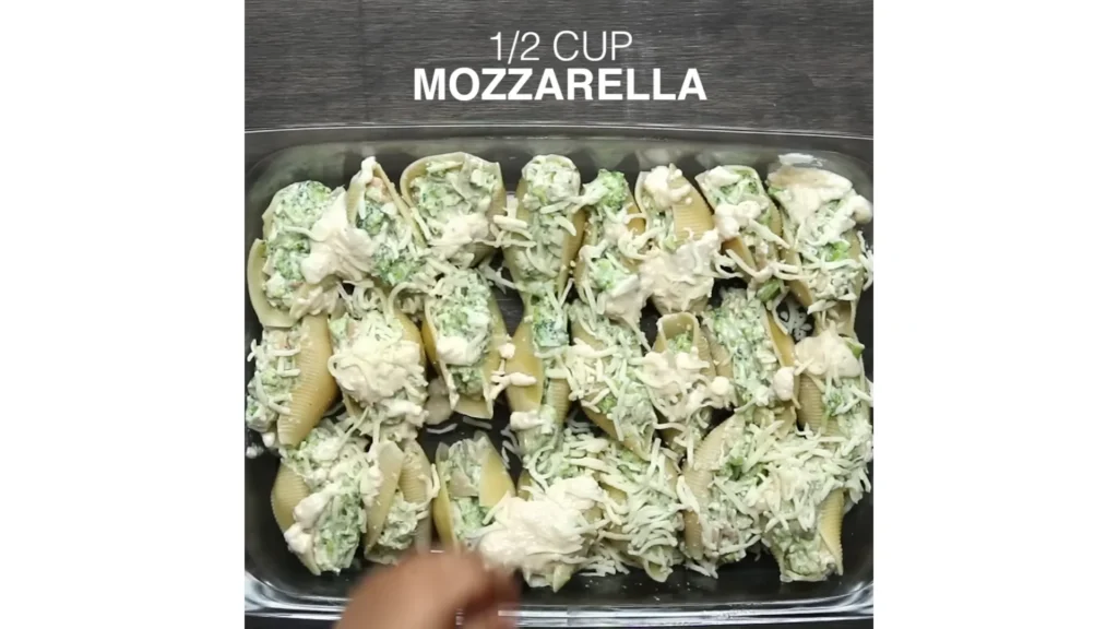 Chicken Broccoli Alfredo Stuffed Shells 11 Top with Alfredo and Cheese