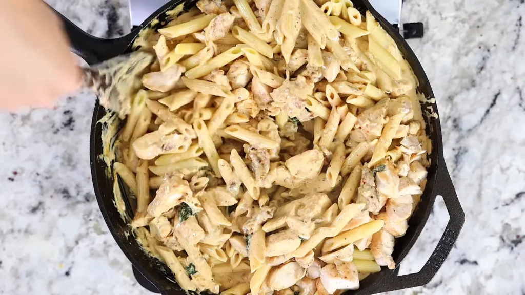 Tuscan chicken pasta 14 Add Cheese and Seasoning