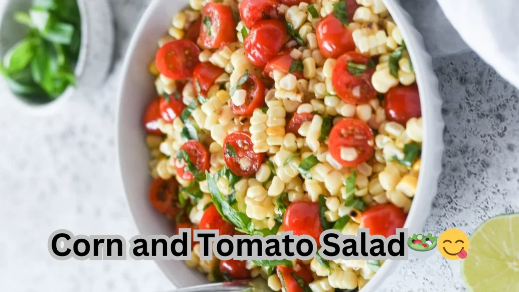 A vibrant corn and tomato salad featuring fresh corn kernels, ripe tomatoes, and a sprinkle of herbs in a bowl.