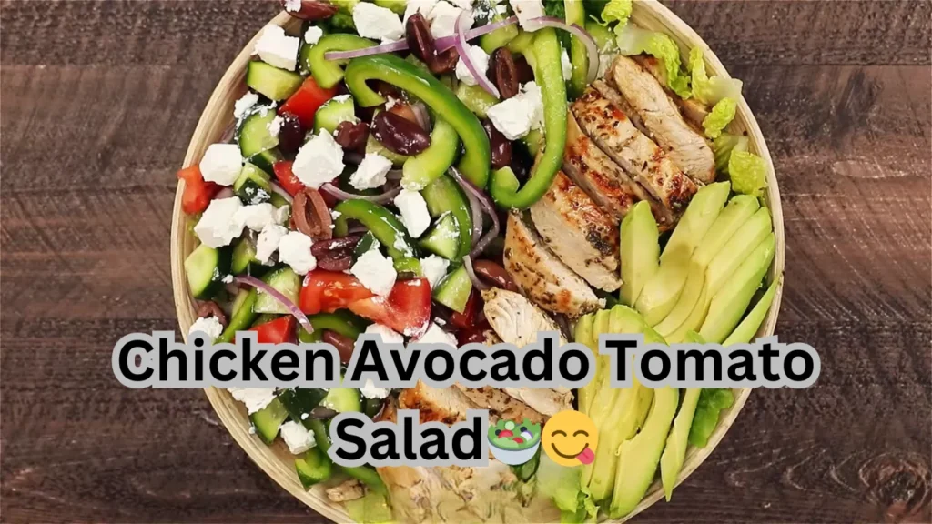 A fresh Chicken Avocado Tomato Salad composed of grilled chicken, avocado slices, and cherry tomatoes, served on a bed of leafy greens.