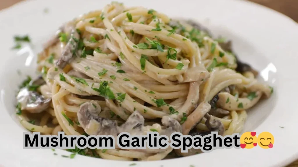 A delicious serving of mushroom garlic spaghetti, featuring tender noodles and a rich, savory sauce.