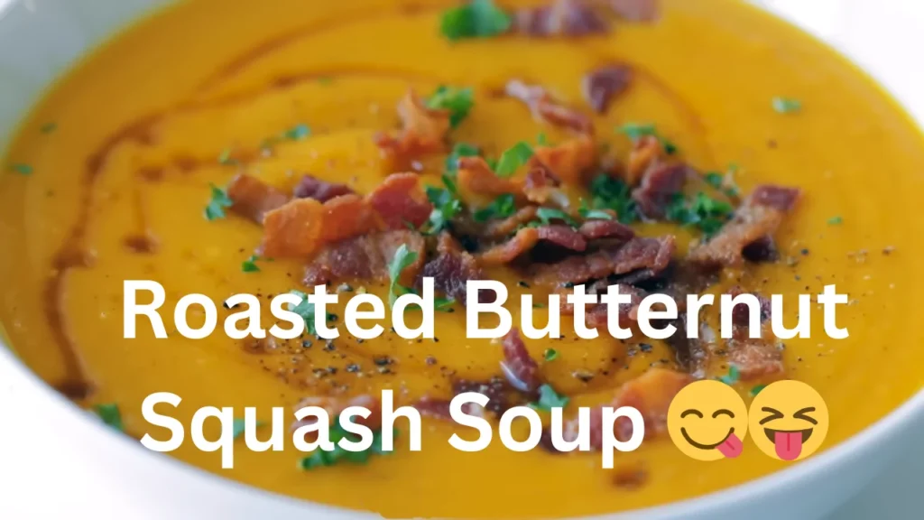 Creamy roasted butternut squash soup garnished with a sprinkle of herbs and a drizzle of olive oil in a rustic bowl.