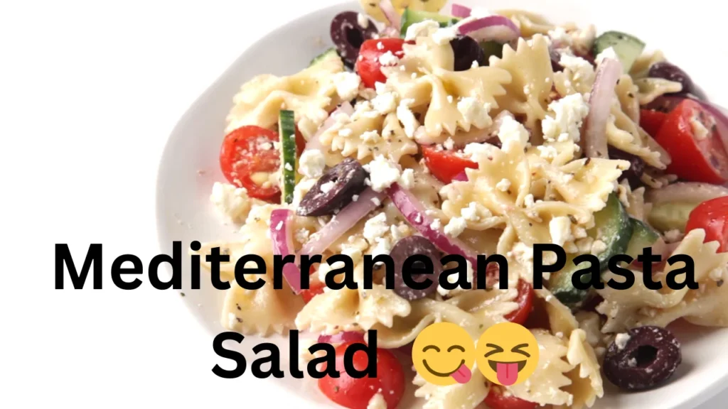 A delicious Mediterranean pasta salad with colorful ingredients like tomatoes, olives, and feta cheese in a serving bowl.