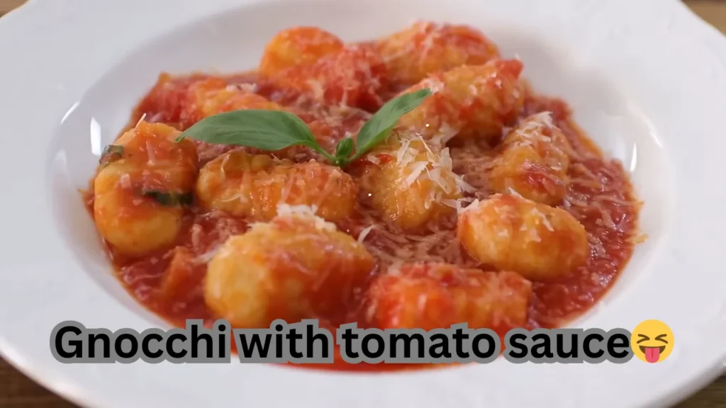 A delicious serving of gnocchi with tomato sauce, perfect for pasta or as a savory dip.